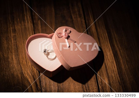 Ring in heart shaped jewelry box 133330499