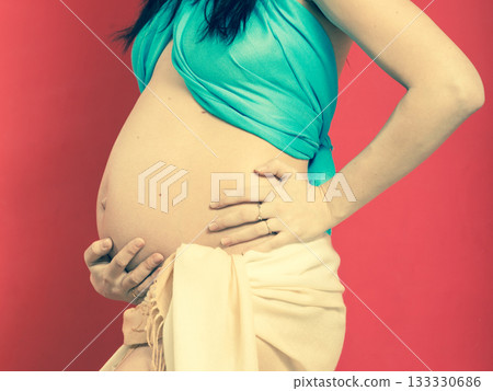 Closeup tummy of pregnant woman Closeup tummy of pregnant woman 133330686