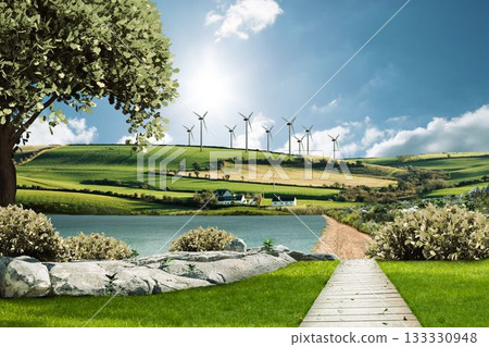 Wooden boardwalk path is leading through grass toward calm lake in flat design with wind turbines 133330948