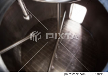Overhead view of empty storage tank at factory 133330958