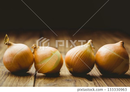 Fresh onion on wooden tables Fresh onion on wooden tables 133330963