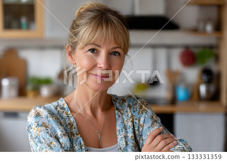 Confident Middle-Aged Woman Relaxing at Home Representing Experience, Serenity, and Natural Beauty in Casual Setting 133331359
