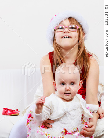 Two beautiful sisters together. 133331403