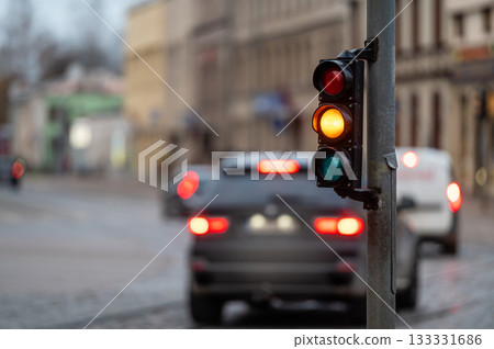 traffic light on the street junction with beautiful bokeh, city with cars in the background traffic light on the street junction with beautiful bokeh, city with cars in the background 133331686