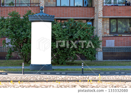 Blank public information board mock-up on the side of the street near a residential building 133332080