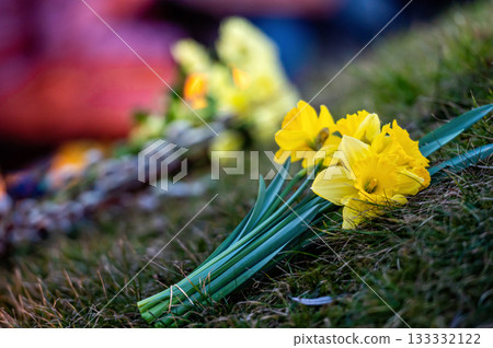 Flowers and candles on streets for peace in Ukraine, symbolising to stop the war, closeup 133332122