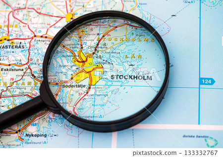 map of Stockholm in Sweden through magnifying glass, travel destination concept 133332767