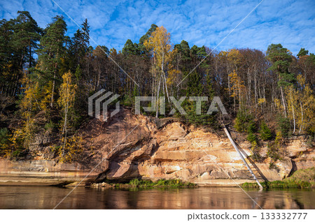 Devils rock and cave by the shores of the River Gauja, Sigulda, Latvia 133332777