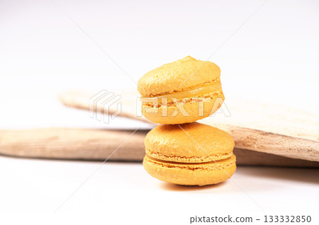 macarons, confectionery sweet product, two yellow macarons isolated on white background, copy space macarons, confectionery sweet product, two yellow macarons isolated on white background, copy space 133332850