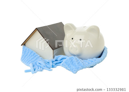 Piggy bank next to a house in a scarf, isolated on white, PNG Piggy bank next to a house in a scarf, isolated on white, PNG 133332981