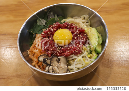 Yukhoe bibimbap, a favorite Korean food 133333528