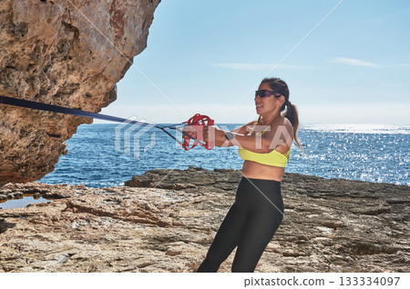 sporty woman on a rock 133334097