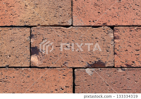 Damaged area of brick paving 133334319