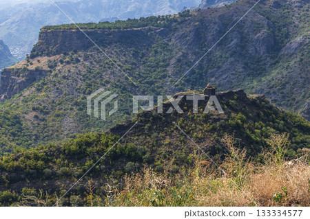 Mountain landscape photo featuring ruined Kayan Fortress placed on top of a hill Mountain landscape photo featuring ruined Kayan Fortress placed on top of a hill 133334577
