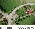 The roundabout road aerial view that newly developed. Summer sunny day. Roundabout on suburban road. 133334679