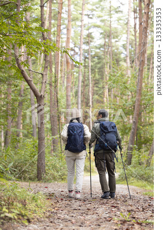 A middle-aged couple enjoying hiking A middle-aged couple enjoying hiking 133335353