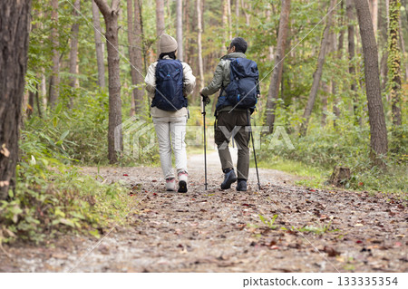 A middle-aged couple enjoying hiking A middle-aged couple enjoying hiking 133335354