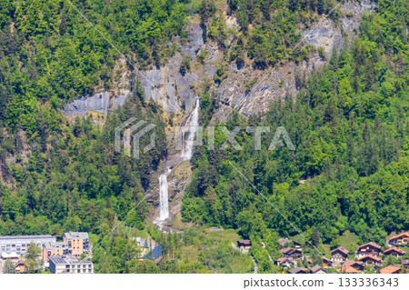 Panoramic view of Meiringen, near Reichenbach falls (Reichenbachfall) at the Swiss Alps in Switzerland 133336343