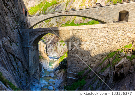 The Devil's Bridge (Teufelsbrucke) over of Schollenen Gorge (Schollenenschlucht) near Andermatt, Switzerland The Devil's Bridge (Teufelsbrucke) over of Schollenen Gorge (Schollenenschlucht) near Andermatt, Switzerland 133336377