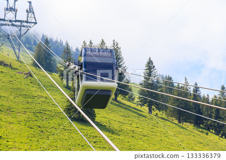 Gondola of Stanserhorn cabrio cable car to Stanserhorn mountain in Switzerland Gondola of Stanserhorn cabrio cable car to Stanserhorn mountain in Switzerland 133336379