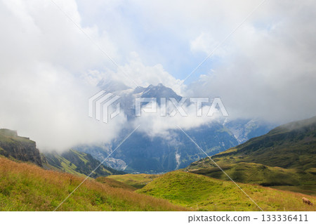 Swiss Alps covered with fog. Travel in Switzerland Swiss Alps covered with fog. Travel in Switzerland 133336411