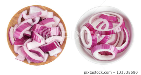Red onion slices in wooden and ceramic bowl isolated on a white background. Top view. Flat lay Red onion slices in wooden and ceramic bowl isolated on a white background. Top view. Flat lay 133338680