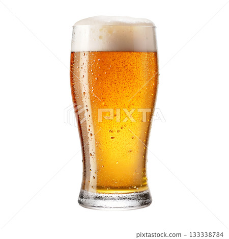 A tall glass filled with amber beer topped with a frothy white head and covered in condensation droplets 133338784