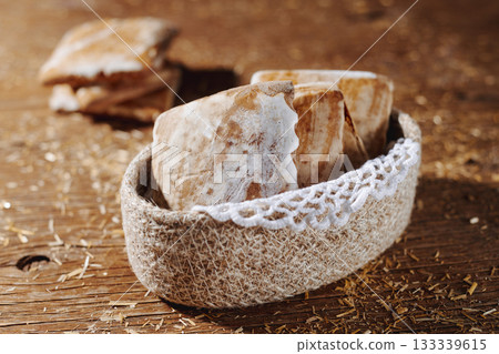 mostaccioli arranged inside a woven basket 133339615