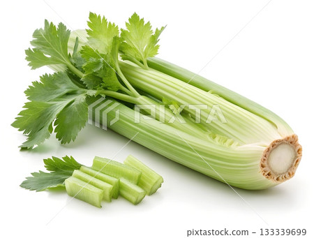 Fresh crisp green celery stalks with leaves and cut pieces on a white background Fresh crisp green celery stalks with leaves and cut pieces on a white background 133339699
