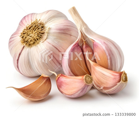 A whole garlic bulb and several peeled garlic cloves arranged closely together on a white background 133339800