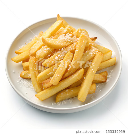 Golden french fries lightly dusted with white seasoning served on a white plate 133339939