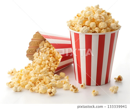 Two striped red and white buckets overflowing with popcorn on a white background Two striped red and white buckets overflowing with popcorn on a white background 133339941