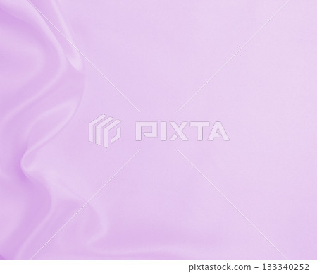 Smooth elegant lilac silk or satin texture as wedding background. Luxurious background design Smooth elegant lilac silk or satin texture as wedding background. Luxurious background design 133340252