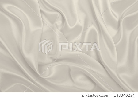 Smooth elegant golden silk or satin luxury cloth texture as wedding background. Luxurious background design. In Sepia toned. Retro style Smooth elegant golden silk or satin luxury cloth texture as wedding background. Luxurious background design. In Sepia toned. Retro style 133340254
