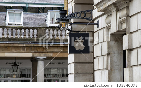 Apple Logo Storefront Sign in a Historic Building in London 133340375