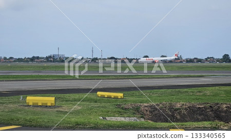 This is Lion Air airplane at Soekarno Hatta airport This is Lion Air airplane at Soekarno Hatta airport 133340565