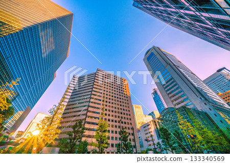 Tokyo cityscape in November. The Otemachi business district is bathed in the setting sun. Otemachi Place is at the top left. 133340569
