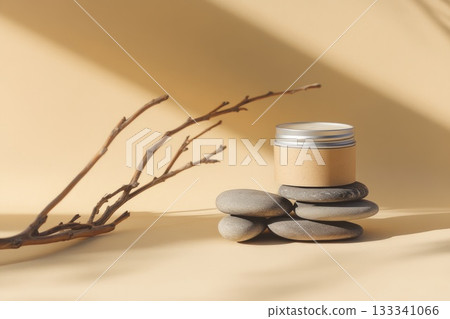 A jar of cream sits on a pile of rocks by a branch. AI-generated content. A jar of cream sits on a pile of rocks by a branch. AI-generated content. 133341066