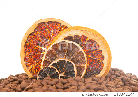 arrangement of dried orange slices in striking red and orange shades 133342144