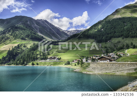 Lake Vernago reflecting the blue sky, Trentino Alto Adige, Italy Lake Vernago reflecting the blue sky, Trentino Alto Adige, Italy 133342536