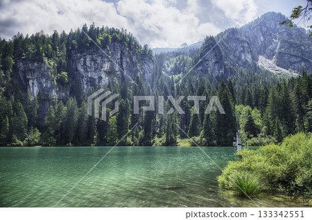 Crystal clear water of Lake Tovel, Trentino Alto Adige, Italy 133342551