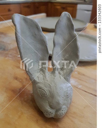 Rustic Clay Rabbit Sculpture: Handmade Artistic Creation 133342603