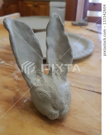 Rustic Clay Rabbit Sculpture: Handmade Artistic Creation 133342604