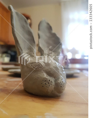 Rustic Clay Rabbit Sculpture: Handmade Artistic Creation 133342605