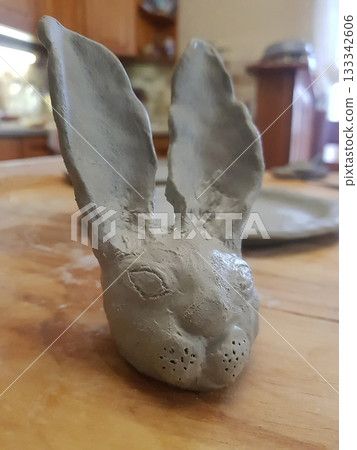 Rustic Clay Rabbit Sculpture: Handmade Artistic Creation 133342606