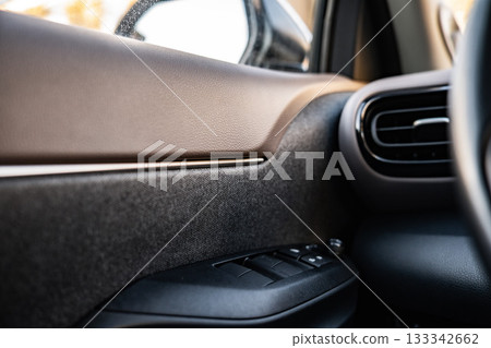 Netherlands - November 2025 : Toyota Yaris Cross interior. Hybrid subcompact crossover SUV produced Toyota. interior design new Toyota Yaris Cross model design inside the cabin. 133342662