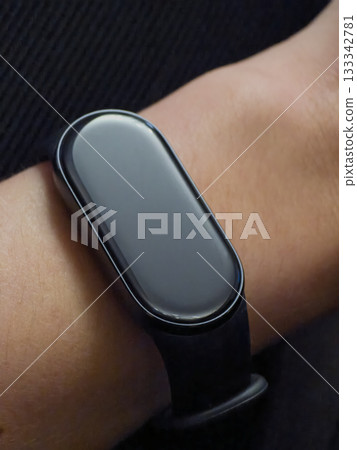 Fitness Tracker on Wrist, Black Band and Display 133342781