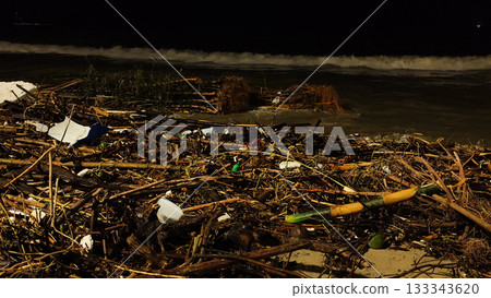Nha Trang beach covered with storm debris during rainy season 133343620