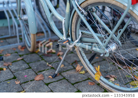 parked bicycle parked in the street 133343958