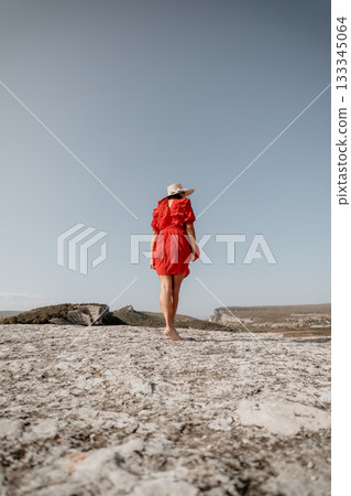 Woman in Red Dress on Mountain Top Woman in Red Dress on Mountain Top 133345064
